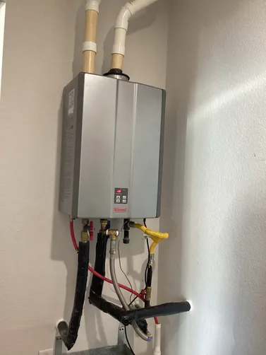 photo at Bandera, TX on Feb 13, 2026: Intermittent hot water issues had been troubling the Rinnai tankless unit, prompting a follow-up vi photo at Bandera, TX on Feb 13, 2026: Intermittent hot water issues had been troubling the Rinnai tankless unit, prompting a follow-up vi
