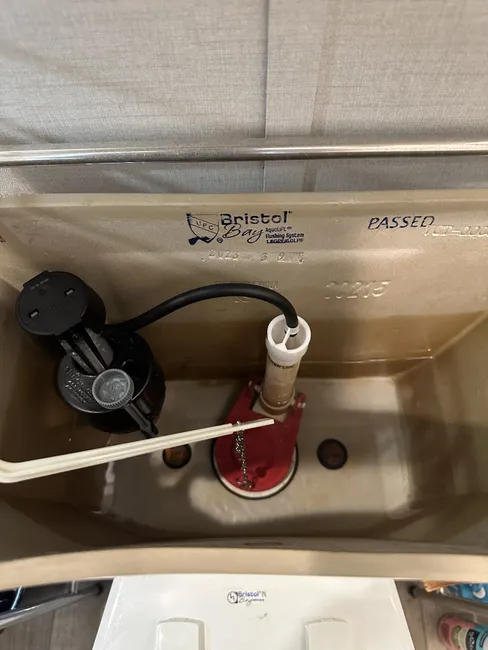 The Bristol toilet was repaired by replacing the faulty flapper, restoring functionality and efficiency.