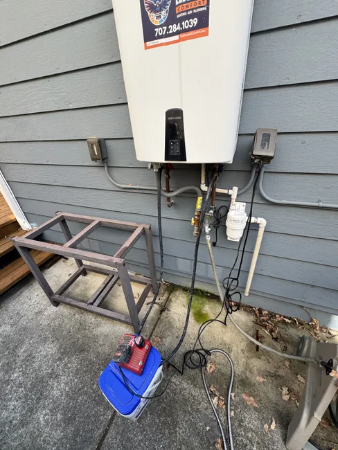 Restored optimal functionality to a tankless water heater by descaling and adding a neutralizer for lasting performance.