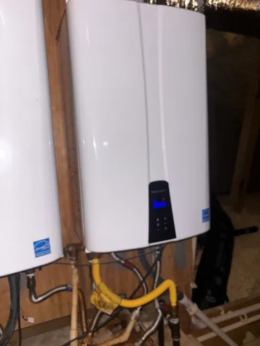 photo at Spring, TX on Dec 26, 2025: An error code 003 indicated an issue with the heat exchanger in the tankless water heater. We repla