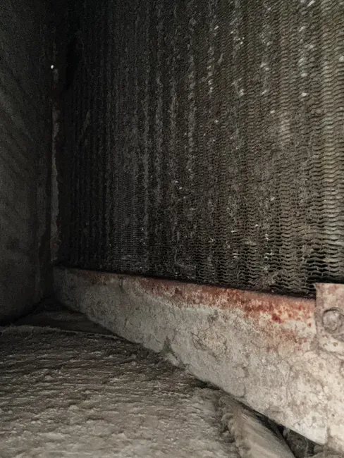 After cleaning the dirty evaporator coil, we restored optimal performance to the HVAC system, ensuring comfort for the homeowner.