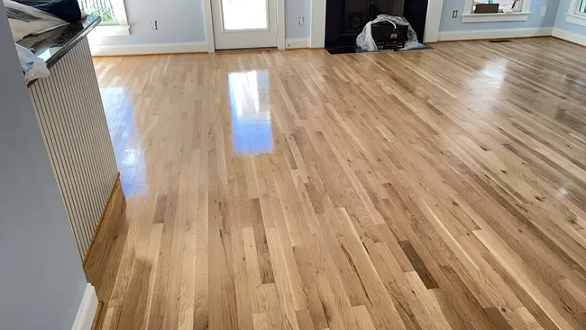Upstairs bedrooms received a complete hardwood installation, expertly sanded and refinished for lasting beauty.