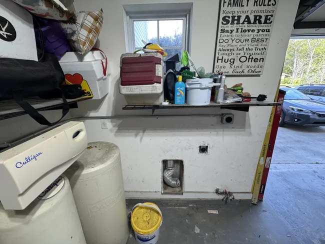 A 50 amp EV receptacle was expertly installed in the garage, providing convenient charging for electric vehicles.