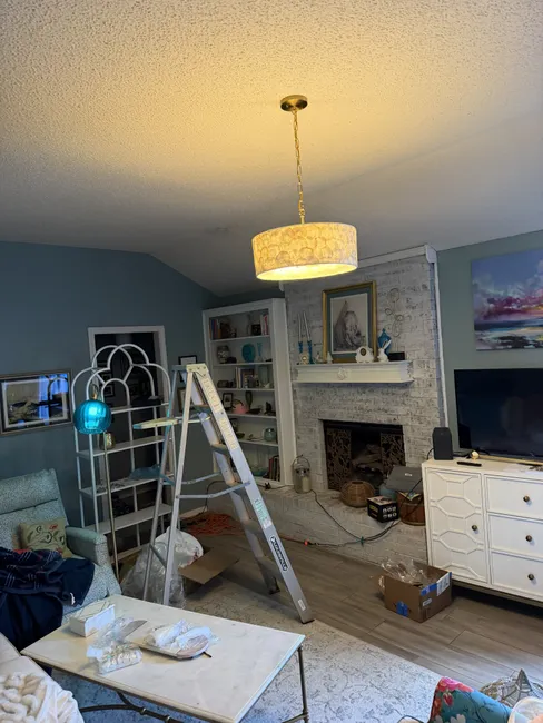 After addressing a blown fuse, we installed a new light fixture and replaced three switches for optimal safety and functionality.