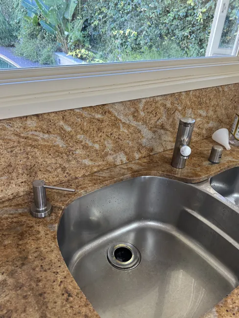 We replaced outdated kitchen fixtures with modern designs, enhancing both functionality and aesthetics.
