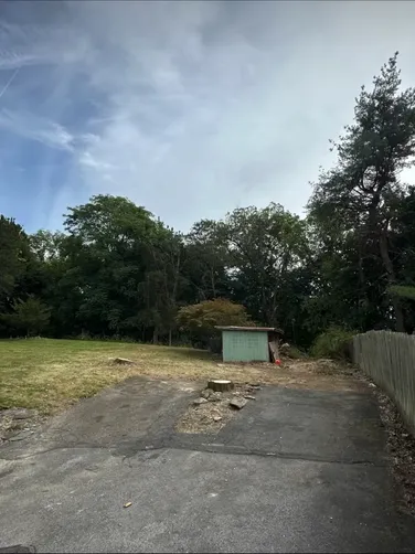photo at Poughkeepsie, NY on Sep 24, 2024: Three large trees posed an issue to the customer expanding their driveway and utilizing their back 