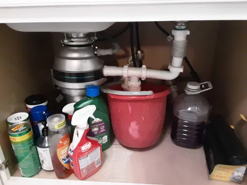 photo at Houston, TX on Dec 29, 2025: When confronted with a clogged drain pipe, we disconnected the plastic P-trap and utilized a small 