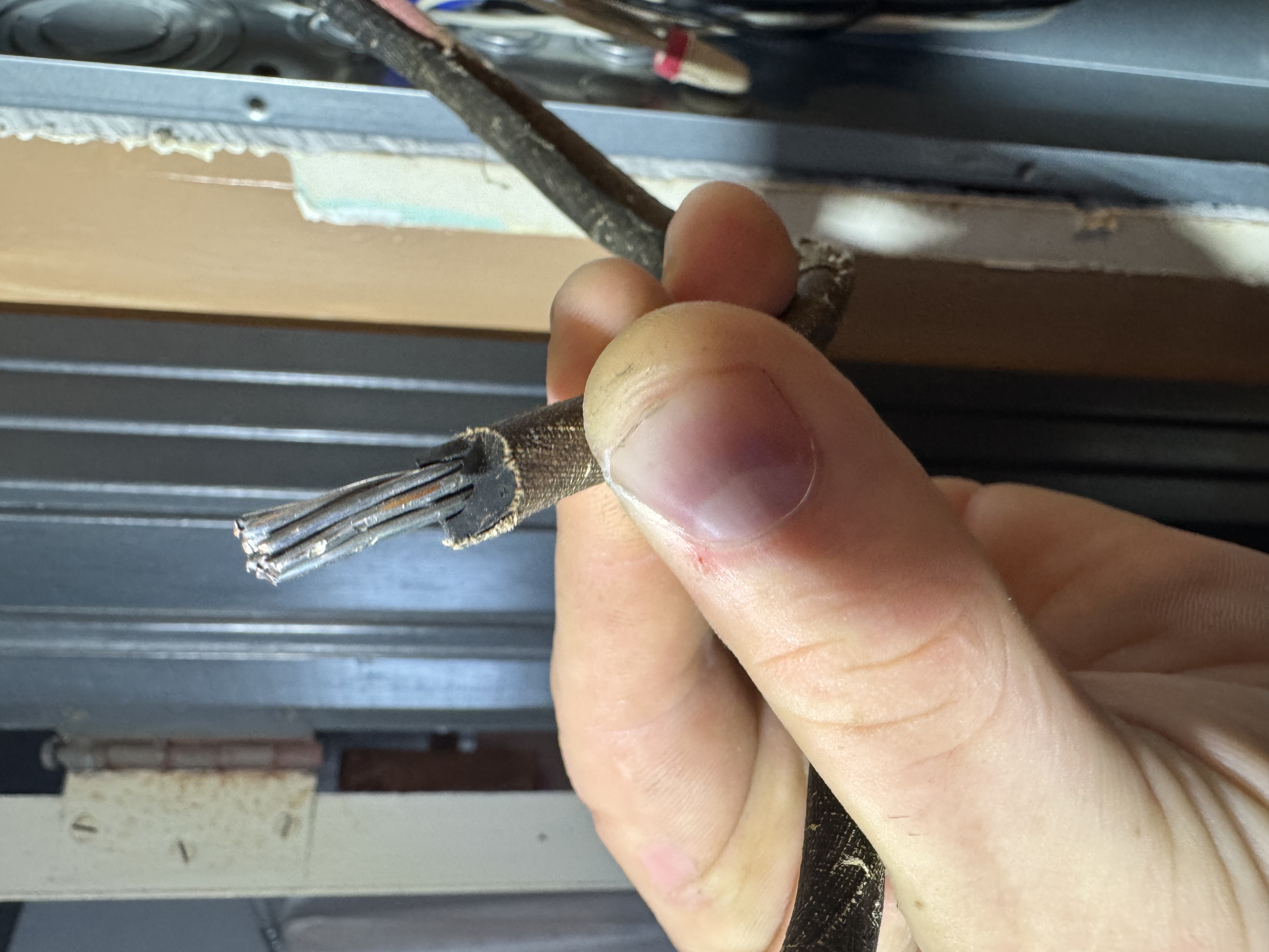 Wiring checked during a St. Augustine insurance inspection follow-up