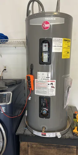 photo at Houston, TX on Apr 23, 2025: The Rheem water heater was not heating properly, which indicated a problem with its lower element. 