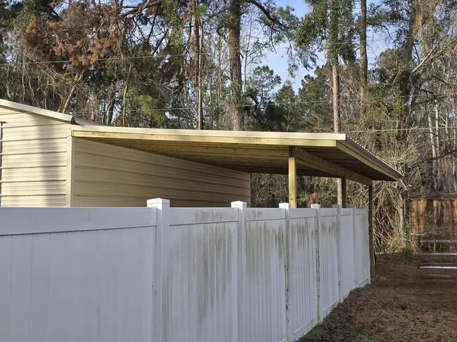 We added a lean-to to the side of the client's garage, providing valuable storage space and enhancing functionality.
