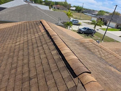 Numerous damaged shingles were replaced, and an active leak was swiftly repaired, ensuring optimal roof health. New 6-inch K-style gutters were installed to enhance drainage and protect the home.