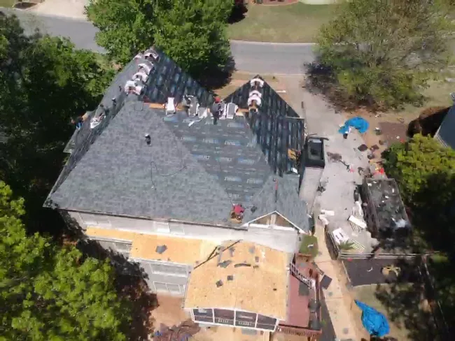 Huge crew out here for a roof replacement in Woodstock.