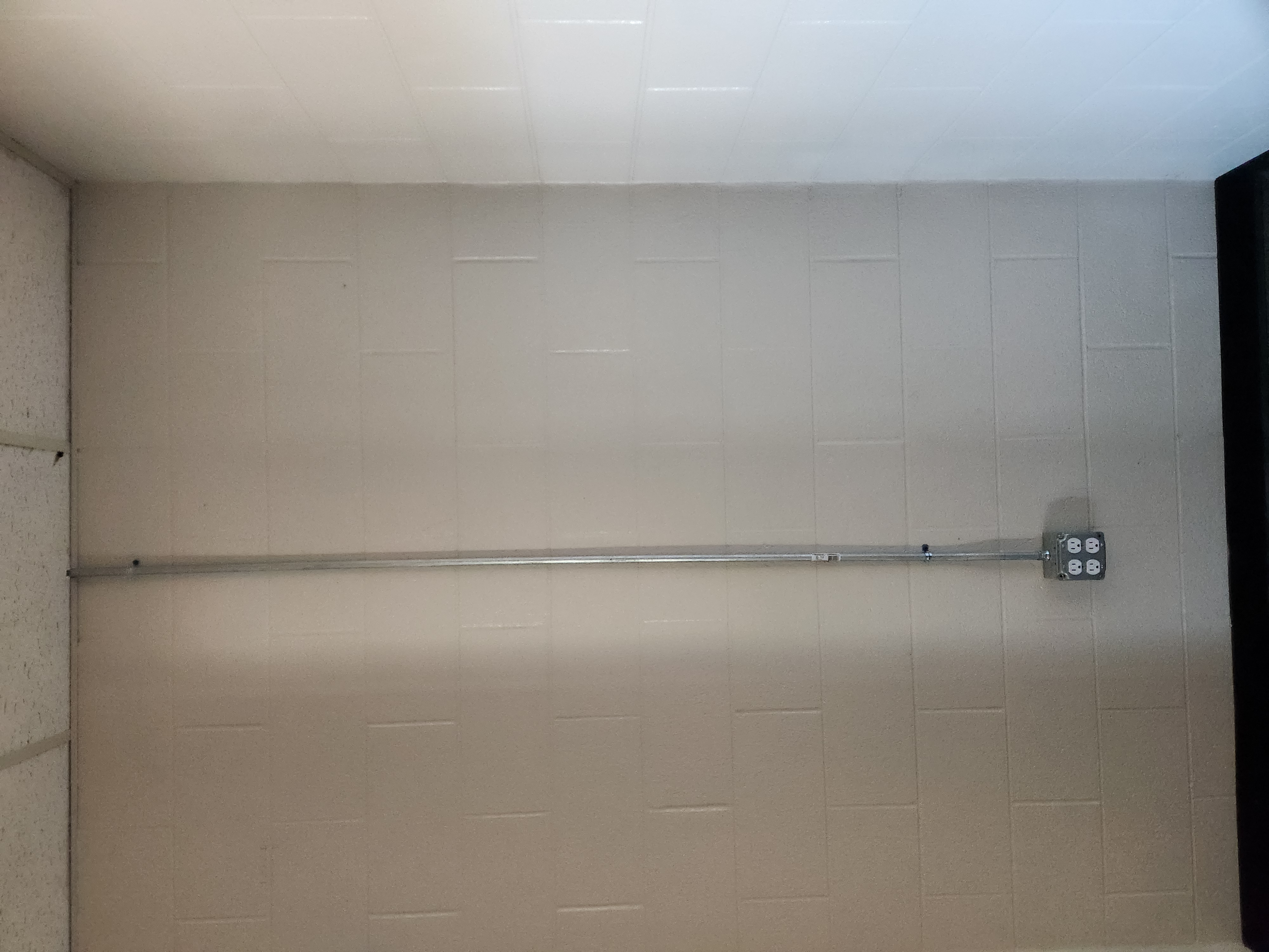 Lighting fixture work at a Moore commercial site