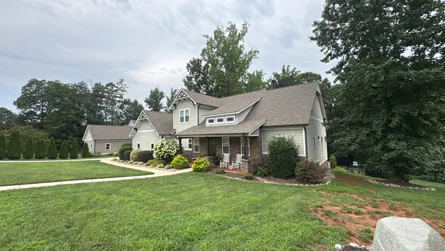 Thorough gutter cleaning was performed in Davidson, removing debris to ensure optimal drainage and prevent damage.