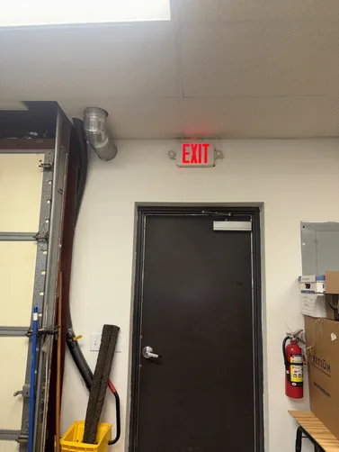 Replaced exit sign.
