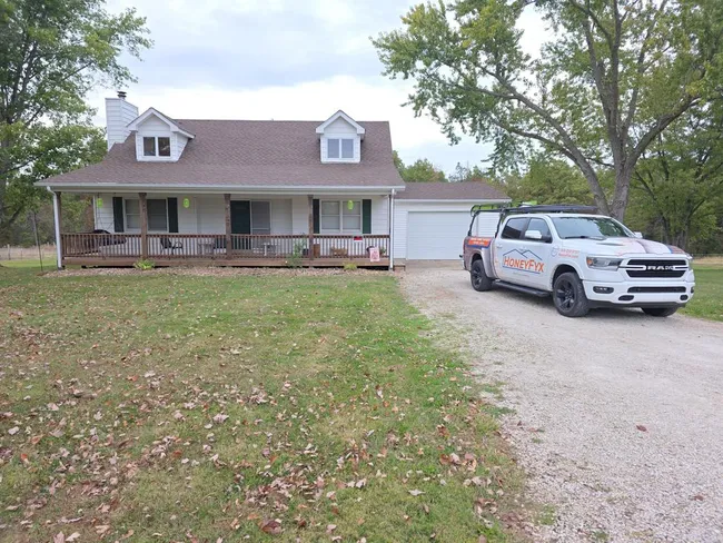 An aging roof in Silex, MO, was replaced with a durable GAF Timberline HDZ asphalt roof in Barkwood, enhancing both aesthetics and protection.