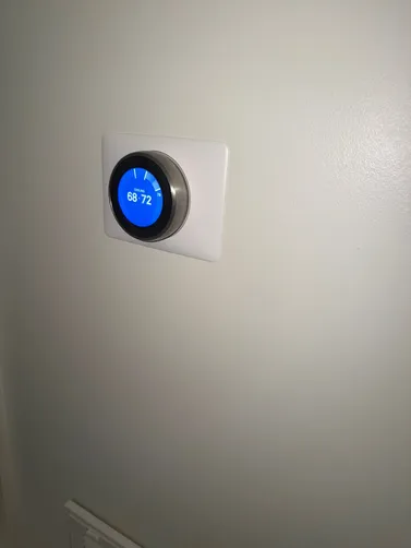 Thermostat photographed during a Homewood cooling diagnostic visit