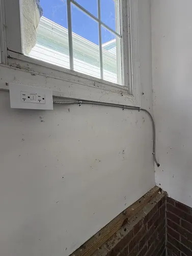 To ensure the tankless water heater operated safely and efficiently, we installed a GFCI (Ground Fault Circuit Interrupter) specifically designed for this purpose.