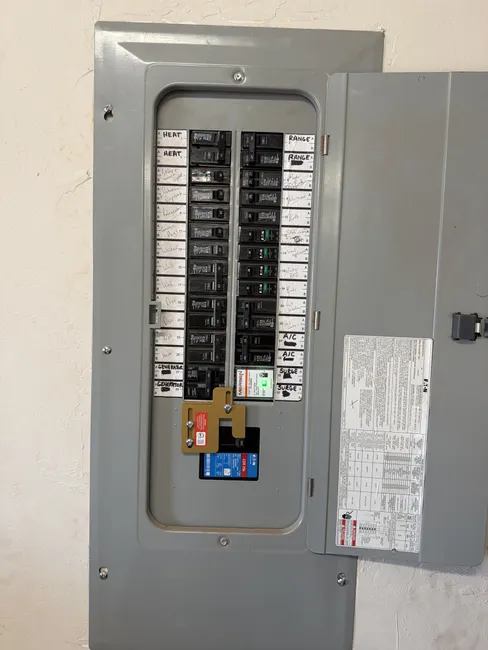 Upgraded a Guthrie shed with a new 50 amp panel and GFCI outlet for enhanced safety and power access.