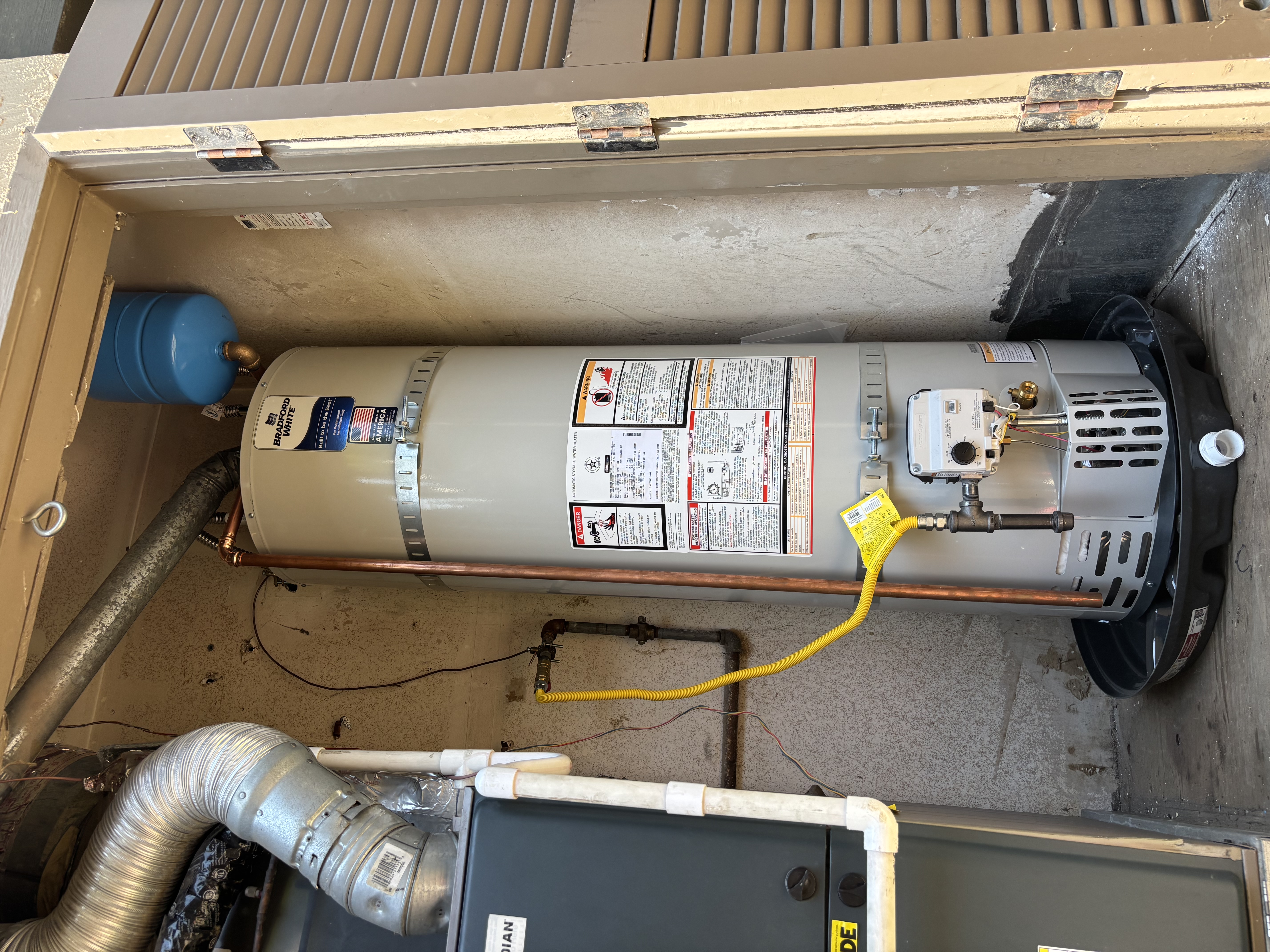 Bradford White water heater installed in an Orange, CA home after the previous tank burst