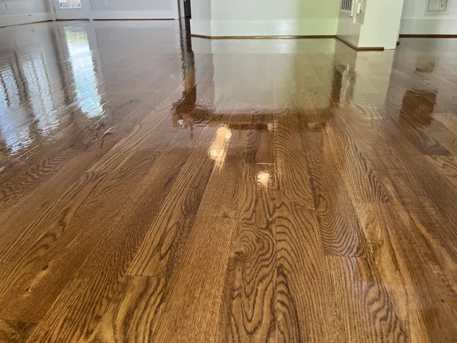 Transformed the space with light sand and redcoat hardwood steps, adding beauty and durability to your home.