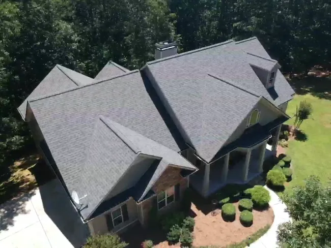 First pic is from the ground before the install. The second pic is our drone shot once the roof has been replaced.