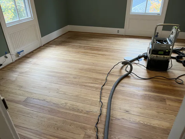 Recently, we refinished pine flooring, restoring its natural beauty and enhancing the home’s warmth.