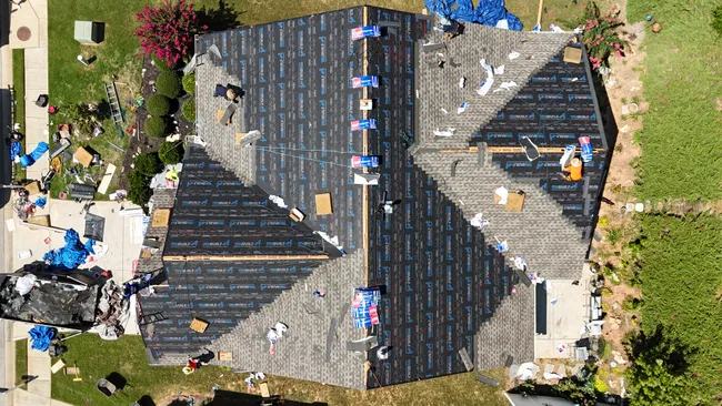 Carol’s worn-out roof was replaced with durable GAF Timberline HDZ shingles in Weatherwood, enhancing her home’s look and longevity.