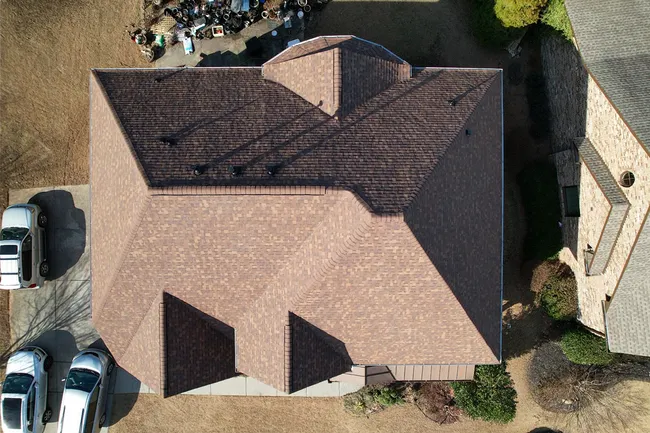 A roof replacement we just finished.  Our customers chose Owens Corning's beautiful new color Desert Rose!