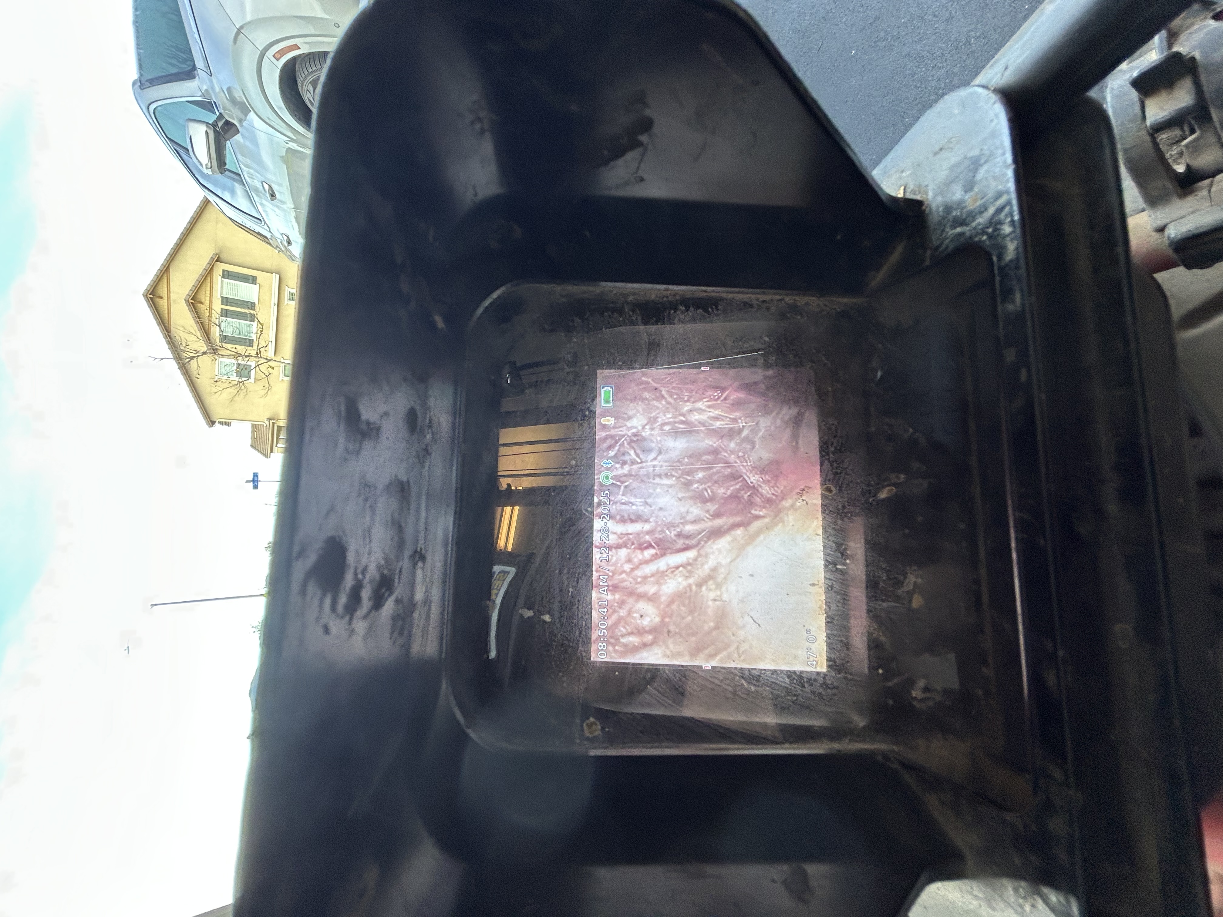 Sewer camera monitor showing a blockage inside the pipe