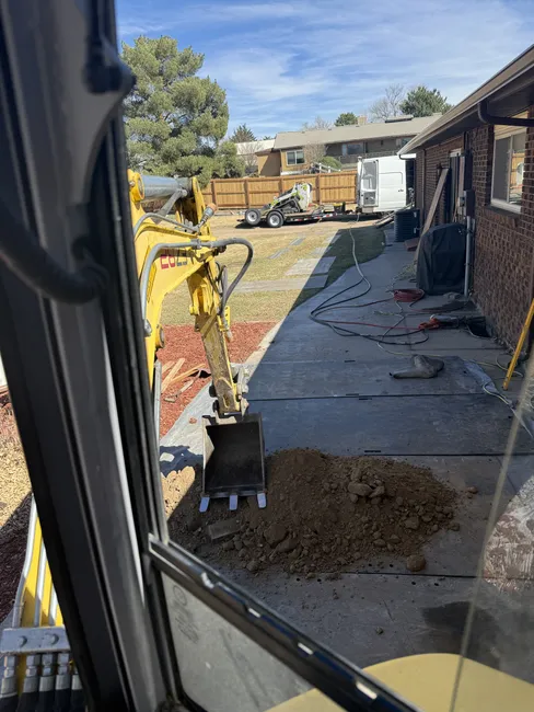 To enhance safety and livability, we installed three egress windows, adding natural light and emergency access.