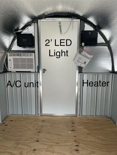 photo at West Tawakoni, TX on Jan 16, 2026: 6x8 deluxe dog house in brilliant white with black trimIncludes heat, ac, insulation, light, solid