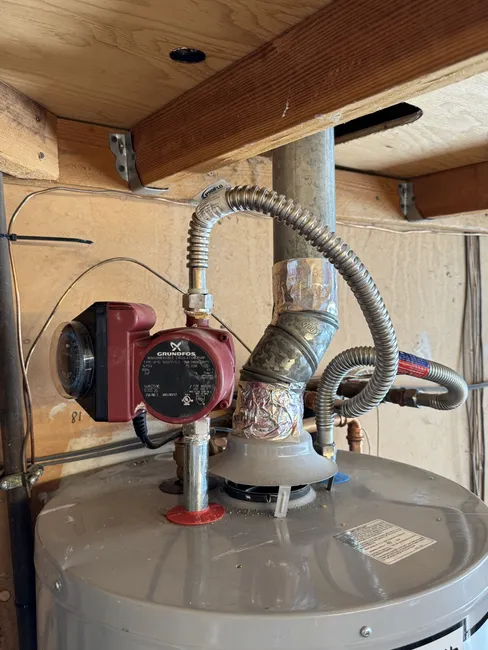 Flushed the water heater and replaced the anode rod, enhancing performance and extending lifespan for the homeowner.