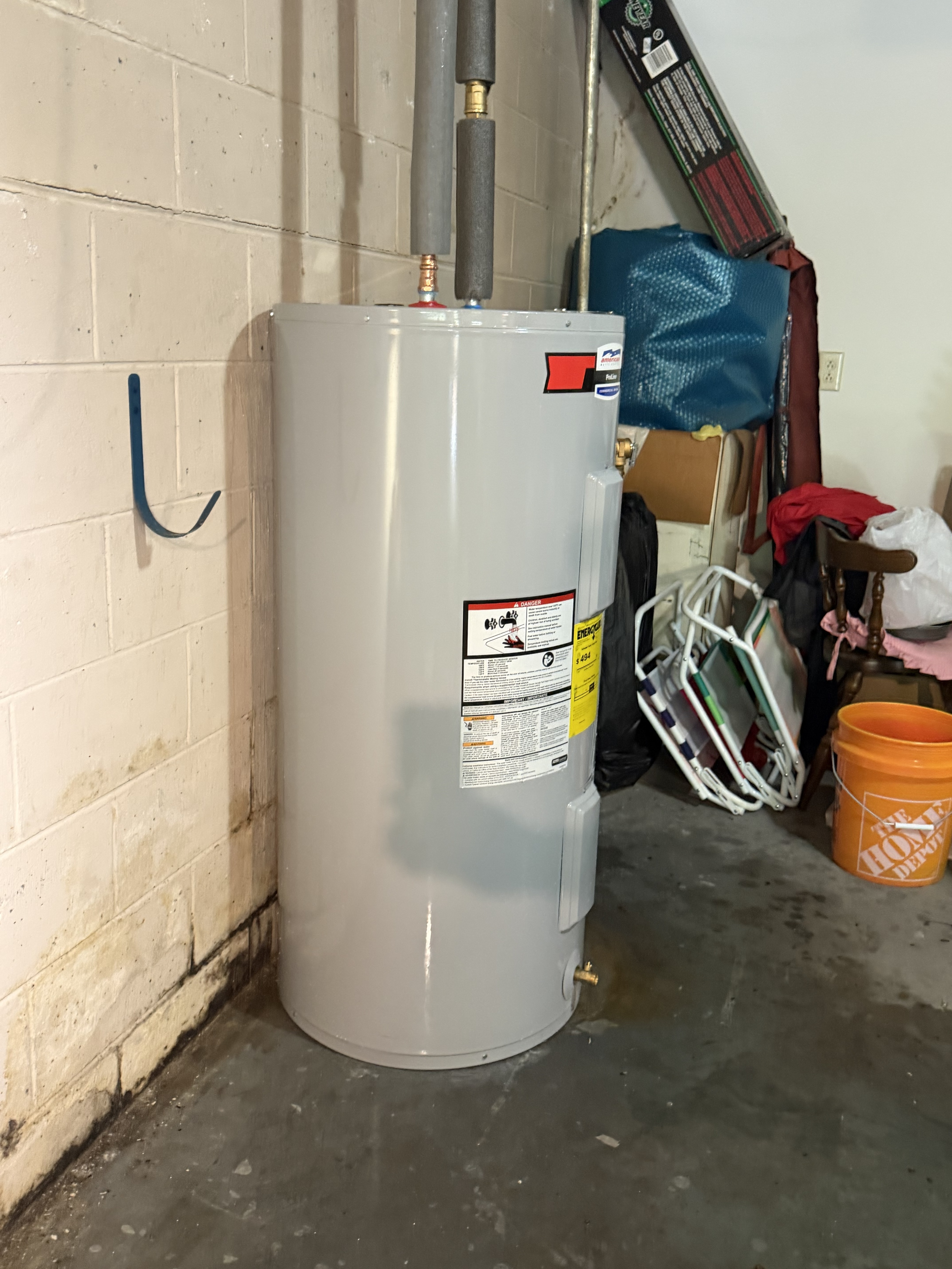 New electric water heater connected in a Cleveland basement