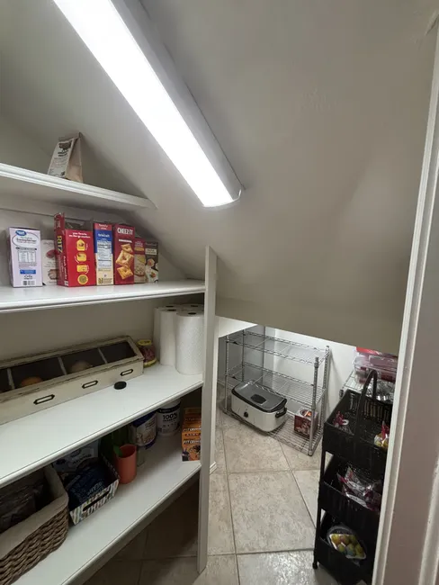 Carefully cutting drywall, we installed a gang box to optimize electrical distribution in this Edmond home.