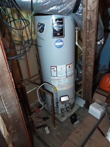 photo at Houston, TX on Nov 27, 2025: The water heater was not functioning due to a faulty temperature sensor and a malfunctioning gas co