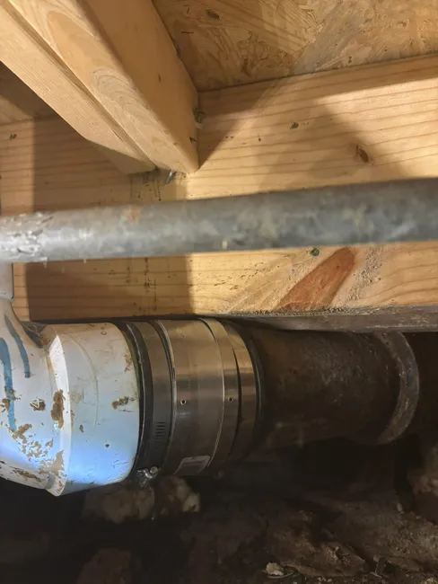 Located and repaired a toilet drain leak connected to the main stack, restoring functionality and peace of mind.