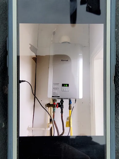 We upgraded a multifamily unit with a new tankless water heater, ensuring reliable hot water and energy savings.