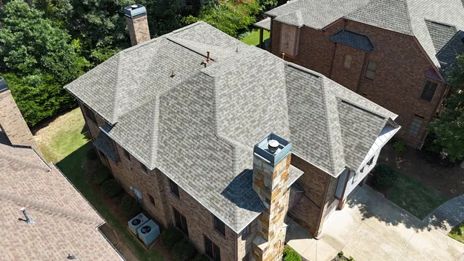A full roof replacement using Owens Corning Duration shingles in Driftwood revitalized Chan’s home, enhancing curb appeal while providing long-lasting protection.