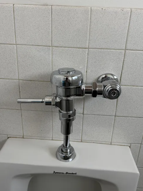 We replaced a malfunctioning urinal flush valve, eliminating leaks and enhancing water efficiency for the homeowner.