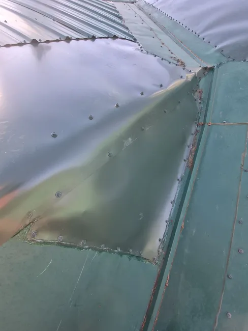 We replaced valley panels with flat sheets and reinforced seals to prevent leaks and ensure winter protection.
