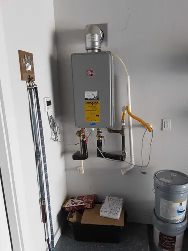 photo at Conroe, TX on Nov 12, 2025: The tankless water heater was not working due to an ignitor issue, which led to no spark. We diagno