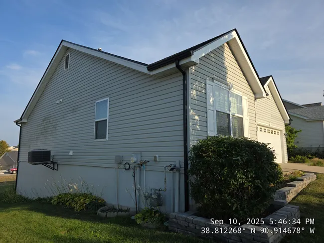 Hail damage led to a complete overhaul: new GAF Timberline HDZ roof, Dutch Lap siding, and updated gutters.