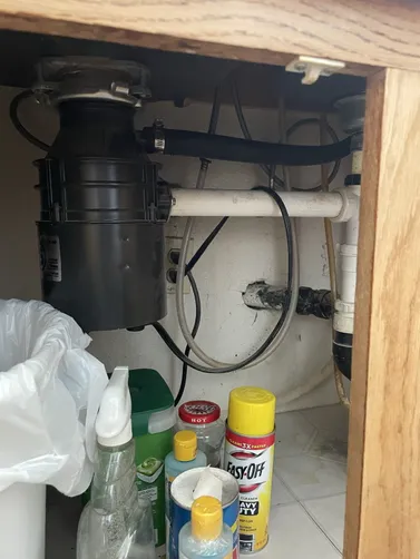 photo at Martinez, CA on Mar 24, 2026: A blocked drain line from the dishwasher to the kitchen drain was causing drainage issues in the ho
