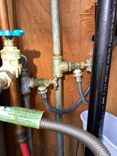 photo at Kerrville, TX on Feb 21, 2026: A leaking hot side valve next to the water heater resulted in water being shut off to the home. We photo at Kerrville, TX on Feb 21, 2026: A leaking hot side valve next to the water heater resulted in water being shut off to the home. We