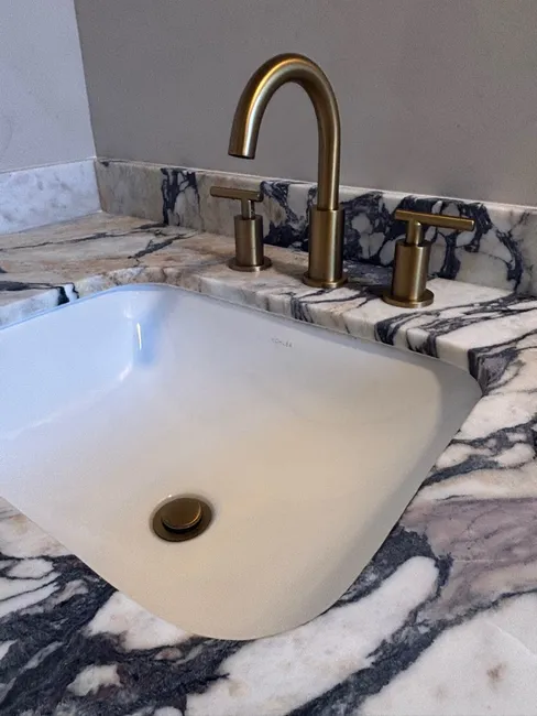 A leaking bathroom faucet was replaced with a high-quality model, enhancing both utility and style. A thorough plumbing inspection ensured all systems are running smoothly.