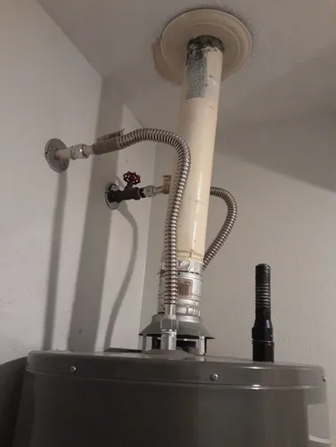 photo at Stafford, TX on Dec 01, 2025: We discovered a leak at the bottom of the water heater, signaling a need for urgent action. After a