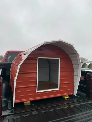 photo at Kemp, TX on Jan 30, 2026: 4x4 Dog House with floor-welded frame-awning on frontRustic Red with White trimPicked up from ou