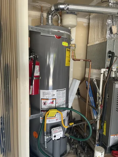 photo at Martinez, CA on Mar 13, 2026: An aging water heater can disrupt daily routines, so we replaced the old unit with a new Rheem 40-g