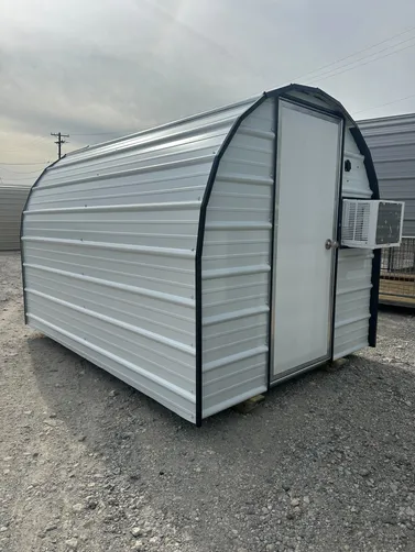 photo at Elm Grove, LA on Jan 12, 2026: CUSTOM 6X8 FULLY ENCLOSED, SOLID FLOOR DOG HOUSE WITH: heat, ac, insulation, light, doggy door-wel